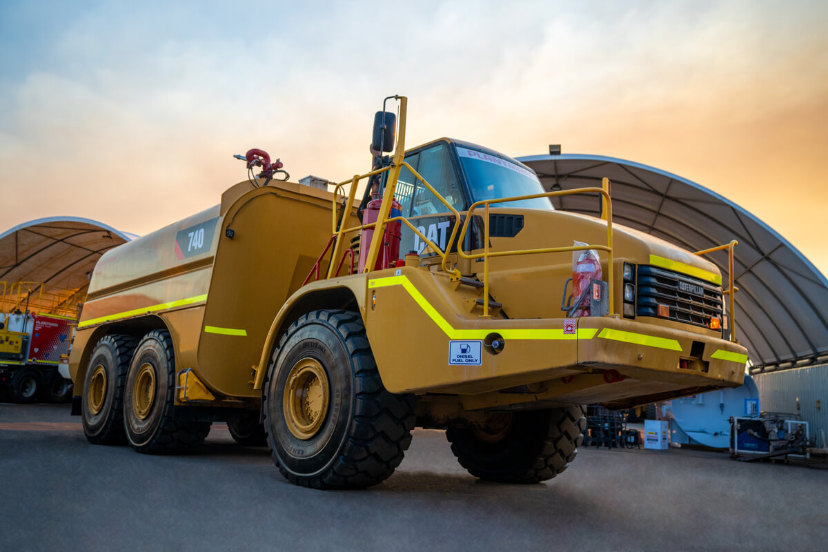 Caterpillar 740 Articulated Water Truck | DT023